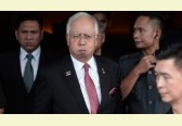 Swiss prosecutors increase pressure on Malaysia over 1MDB investigation